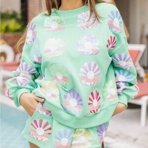 Queen of Sparkles clam shell sweatshirt